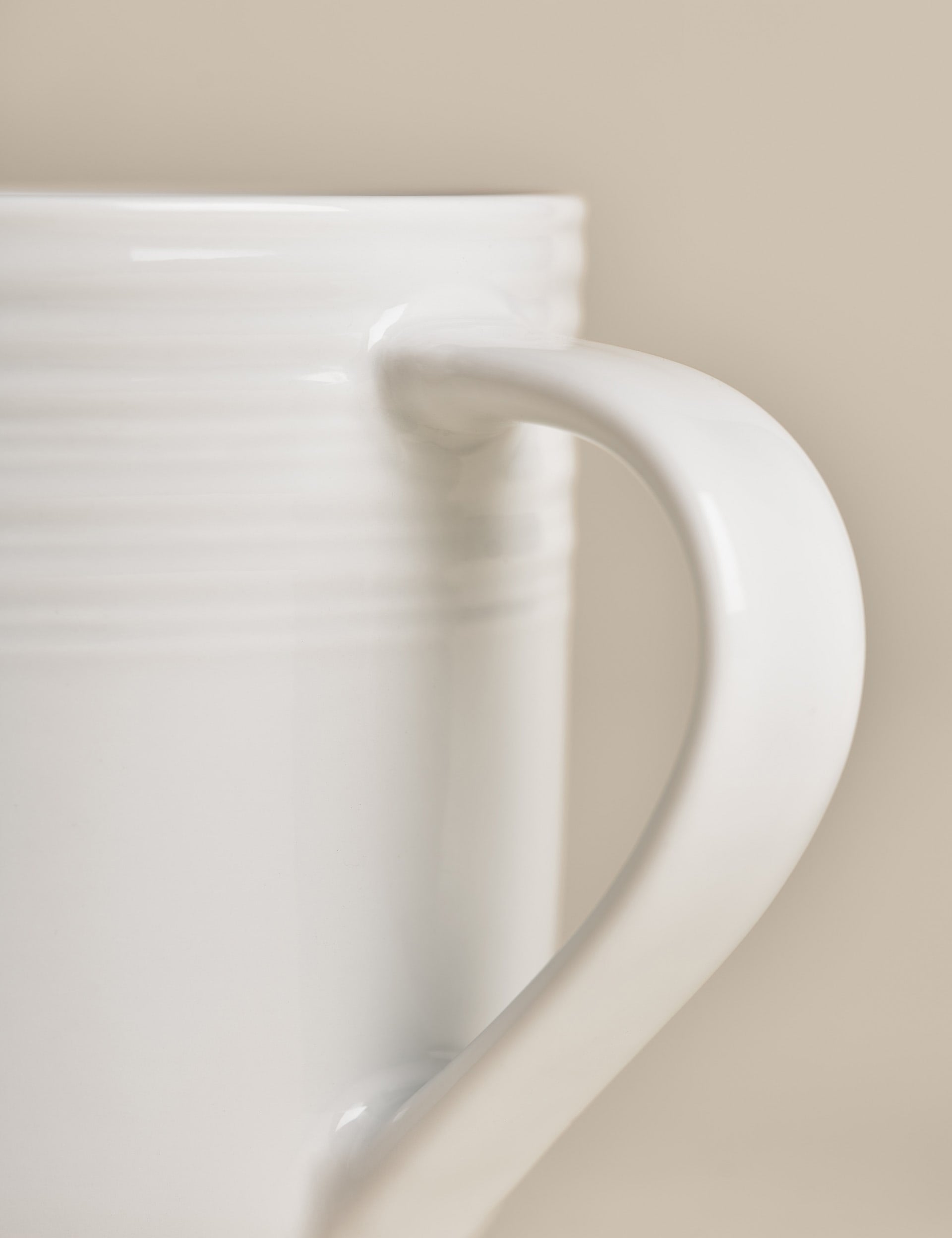 Set of four ribbed porcelain mugs (British brand)