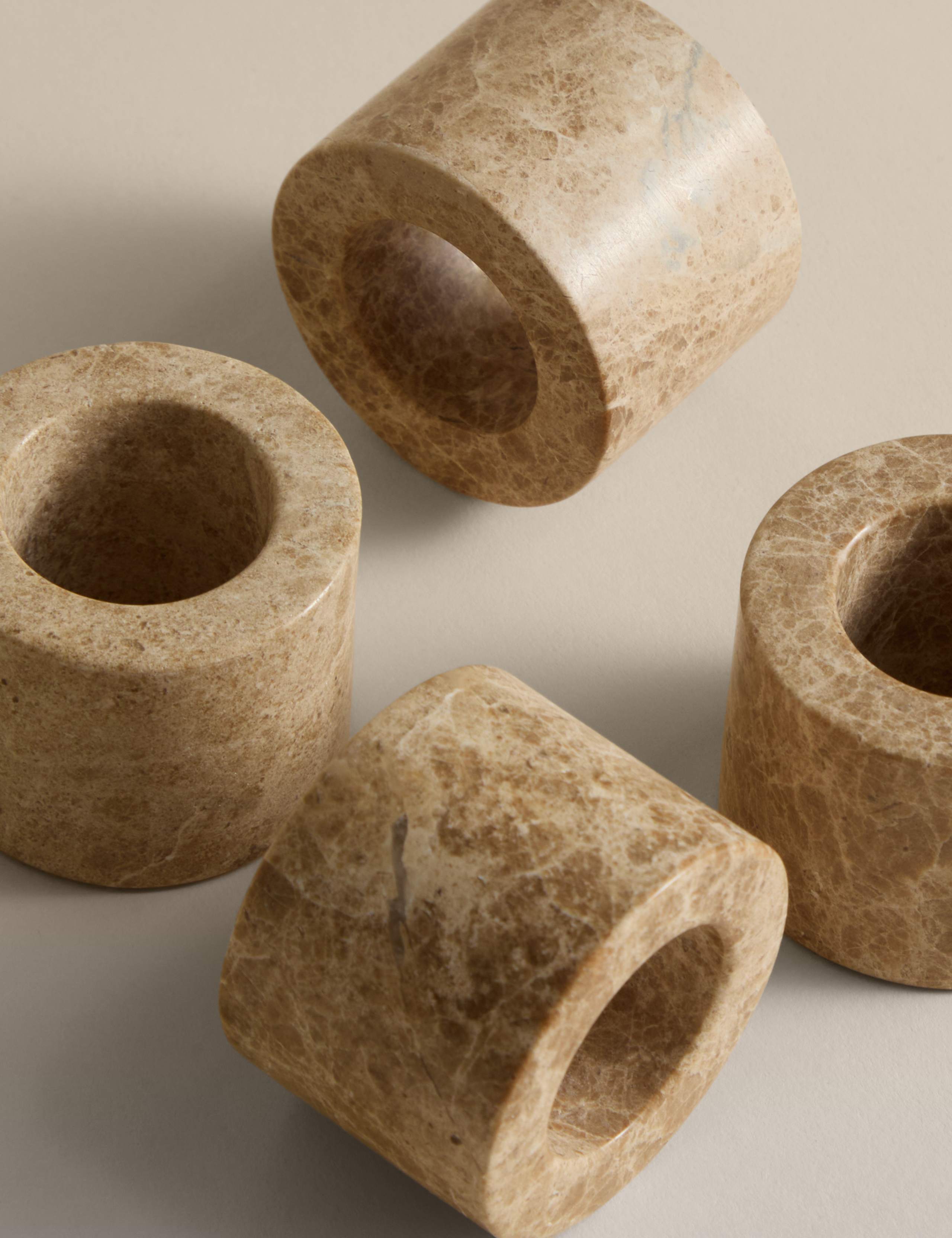 Set of 4 natural stone napkin rings with unique veining (British brand)