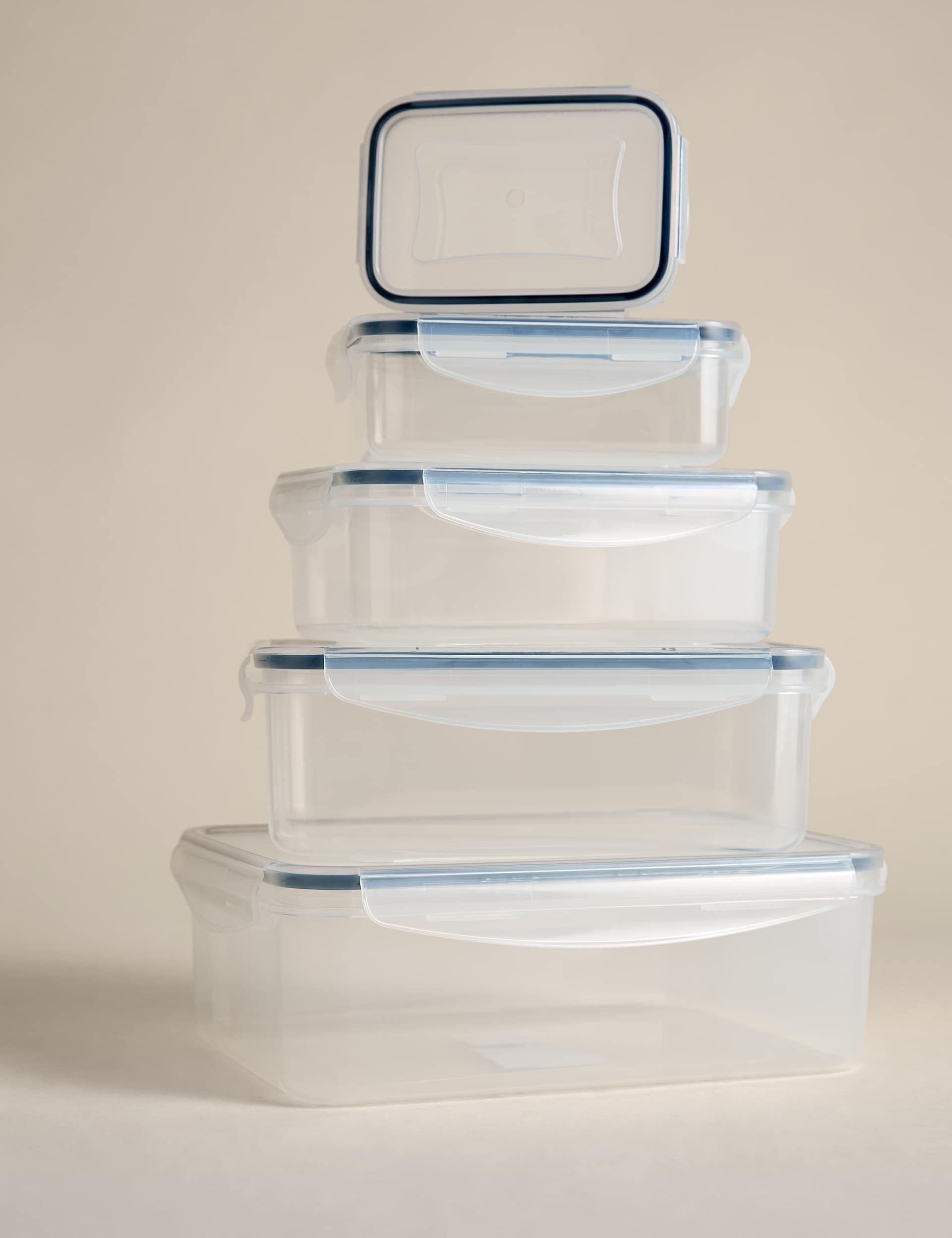 Set of 5 kitchen storage tubs with clip lids and various sizes (British brand)