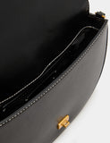 M&S shoulder bag with adjustable strap and compact design (British brand)