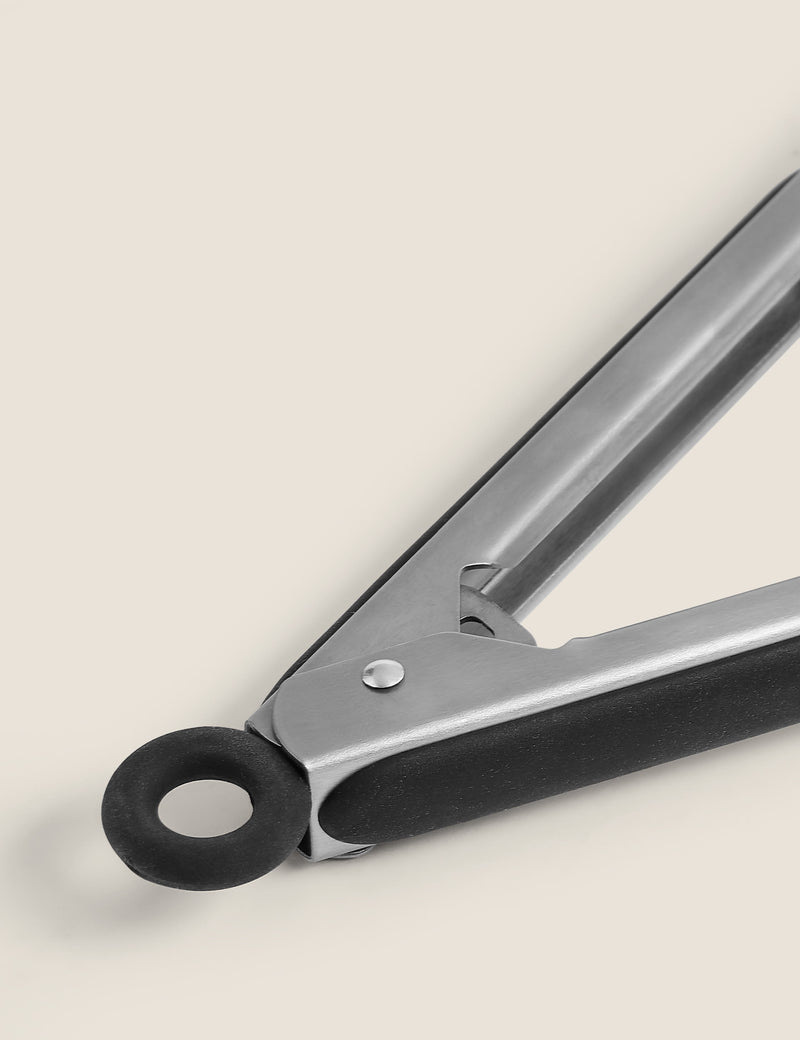 Small silicone tongs with heat-resistant design and locking mechanism (British brand)