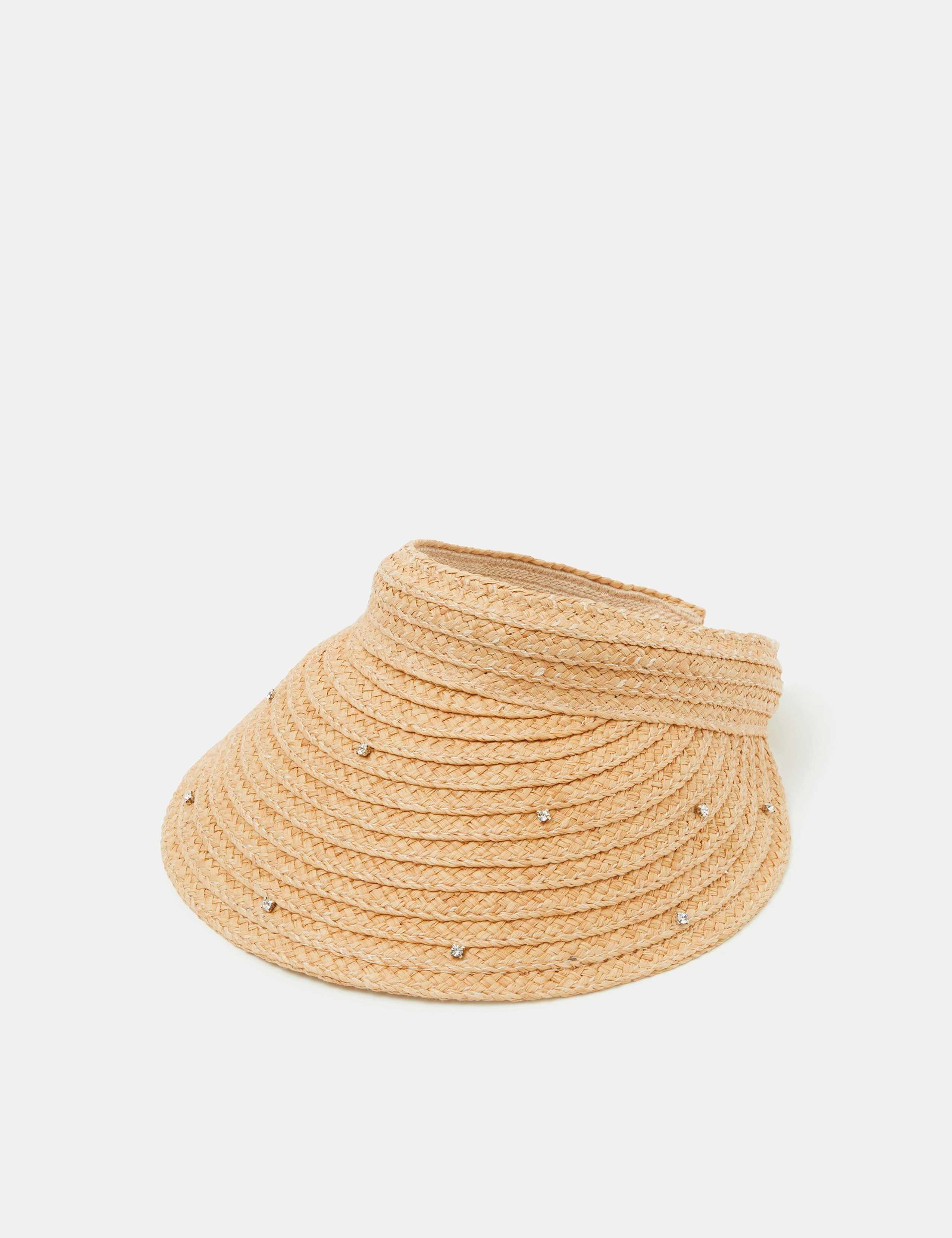 Accessorize straw visor with sparkly embellishments, imported from the UK
