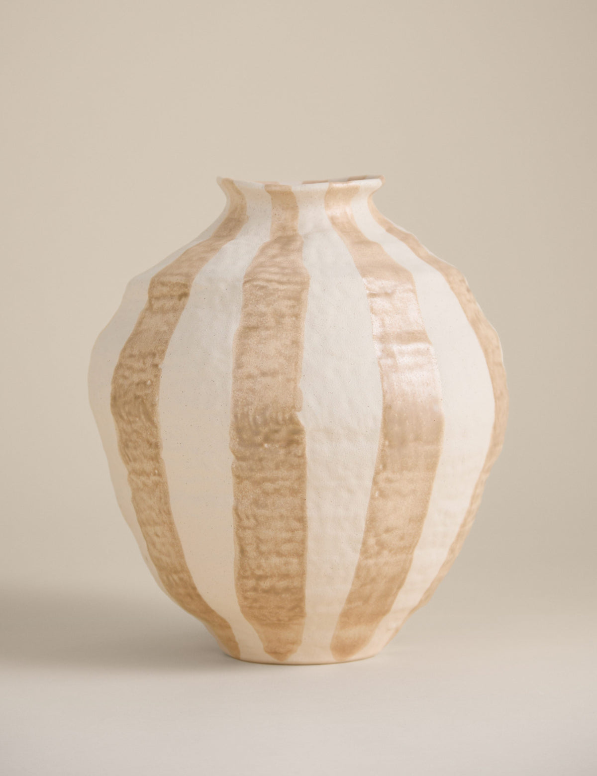Striped ceramic vase with hand-painted pattern, UK version