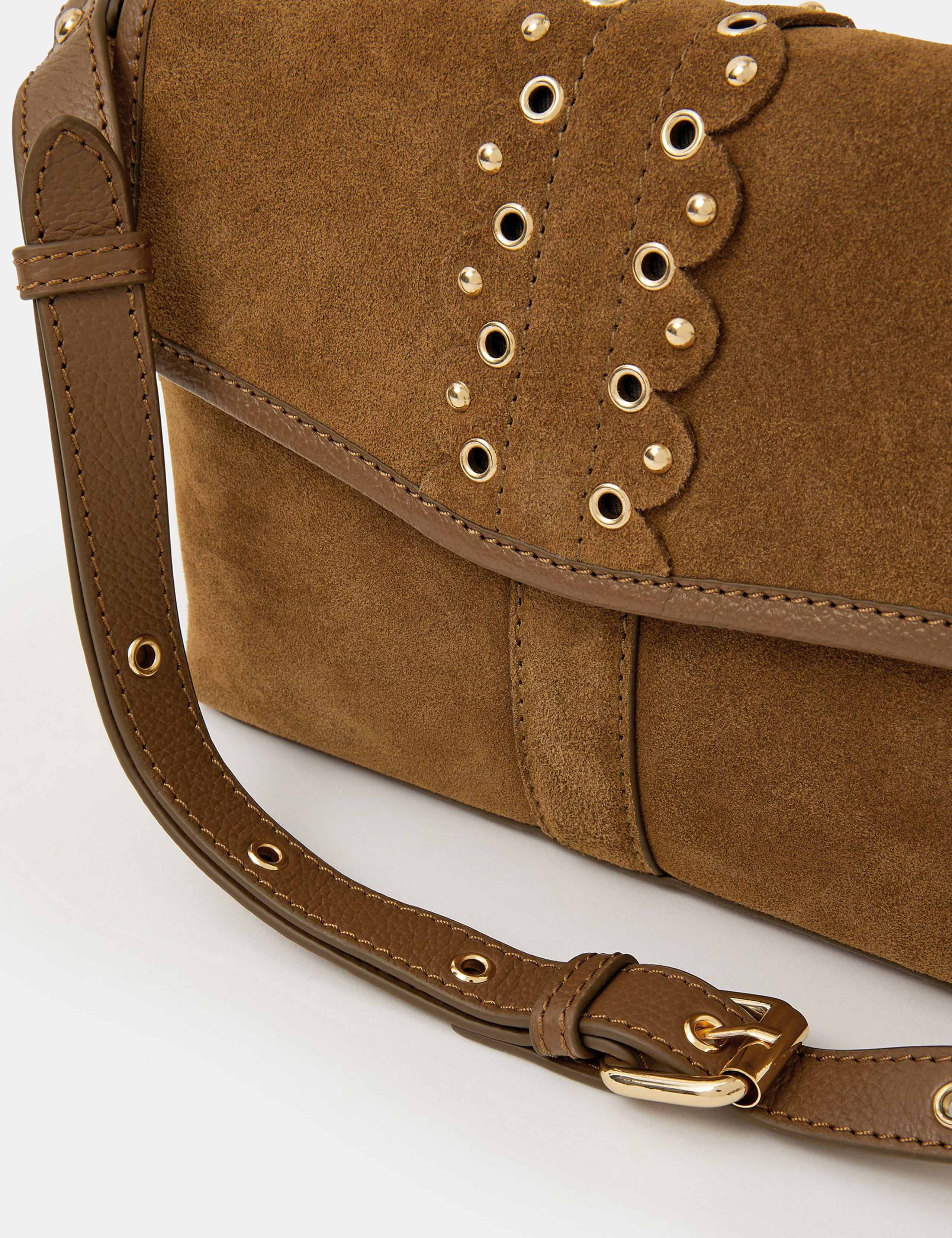 Accessorize suede cross body bag with eyelet detail, UK version