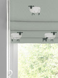 Sophie Allport green sheep pattern roman blind (British brand)