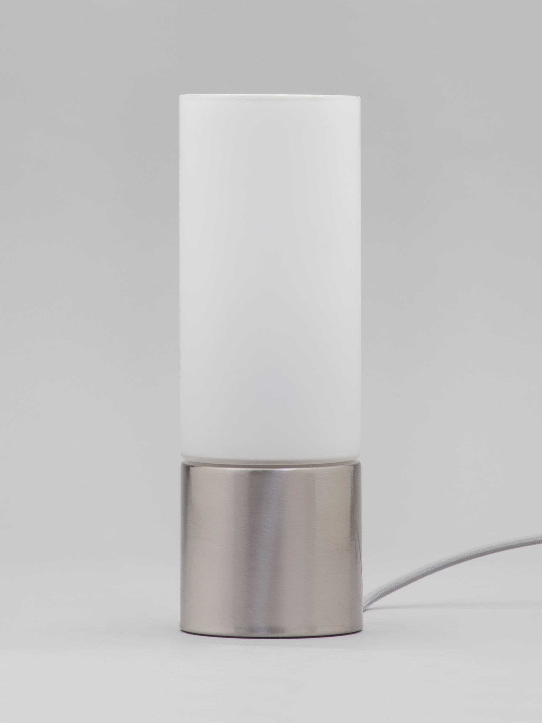 BHS silver cylinder touch lamp, imported from the UK