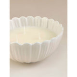 George Home daisy shaped candle with jasmine and amber (British brand)