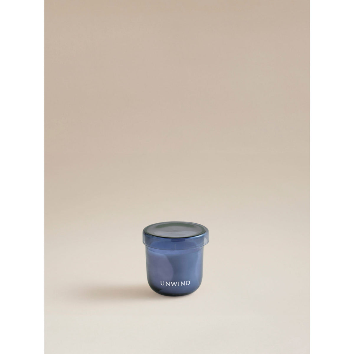George Home blue wellness unwind glass lid candle, imported from the UK