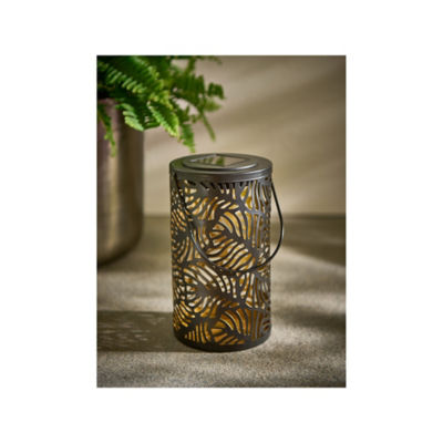 George Home gold-tone solar lantern with leaf print, imported from the UK