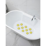 George Home yellow lucky charm smiles PVC bath mat 69x39cm, UK version