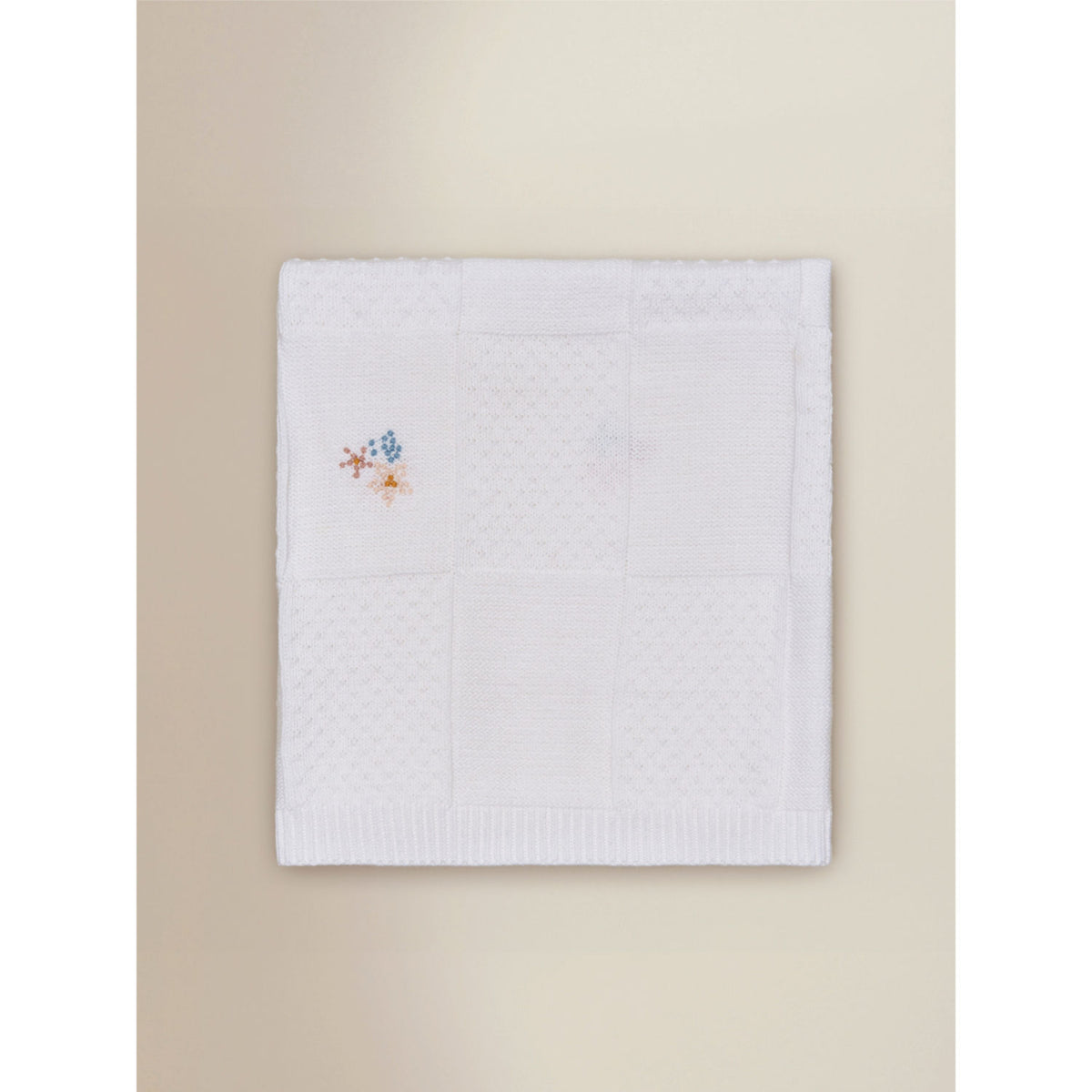 Cream knitted floral blanket 70cm x 100cm (British brand)