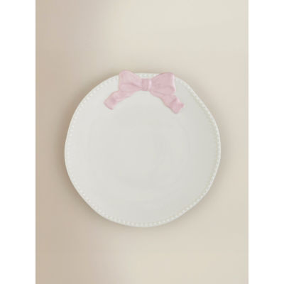 Dinner plate with pink and white bow design, imported from the UK