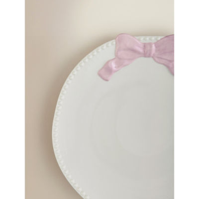 Dinner plate with pink and white bow design, imported from the UK