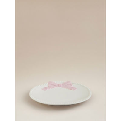 Stoneware side plate with pink and white bow design, imported from the UK