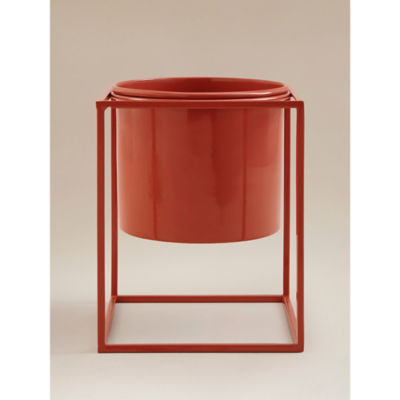 Red metal planter with geometric steel stand - British product