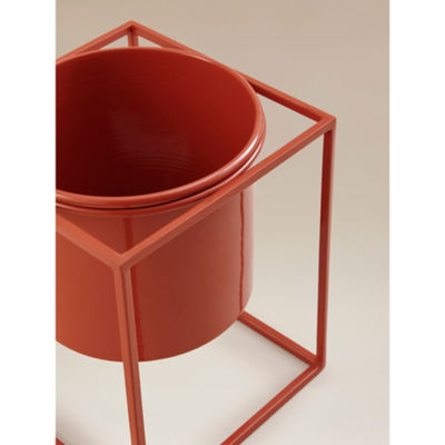 Red metal planter with geometric steel stand - British product