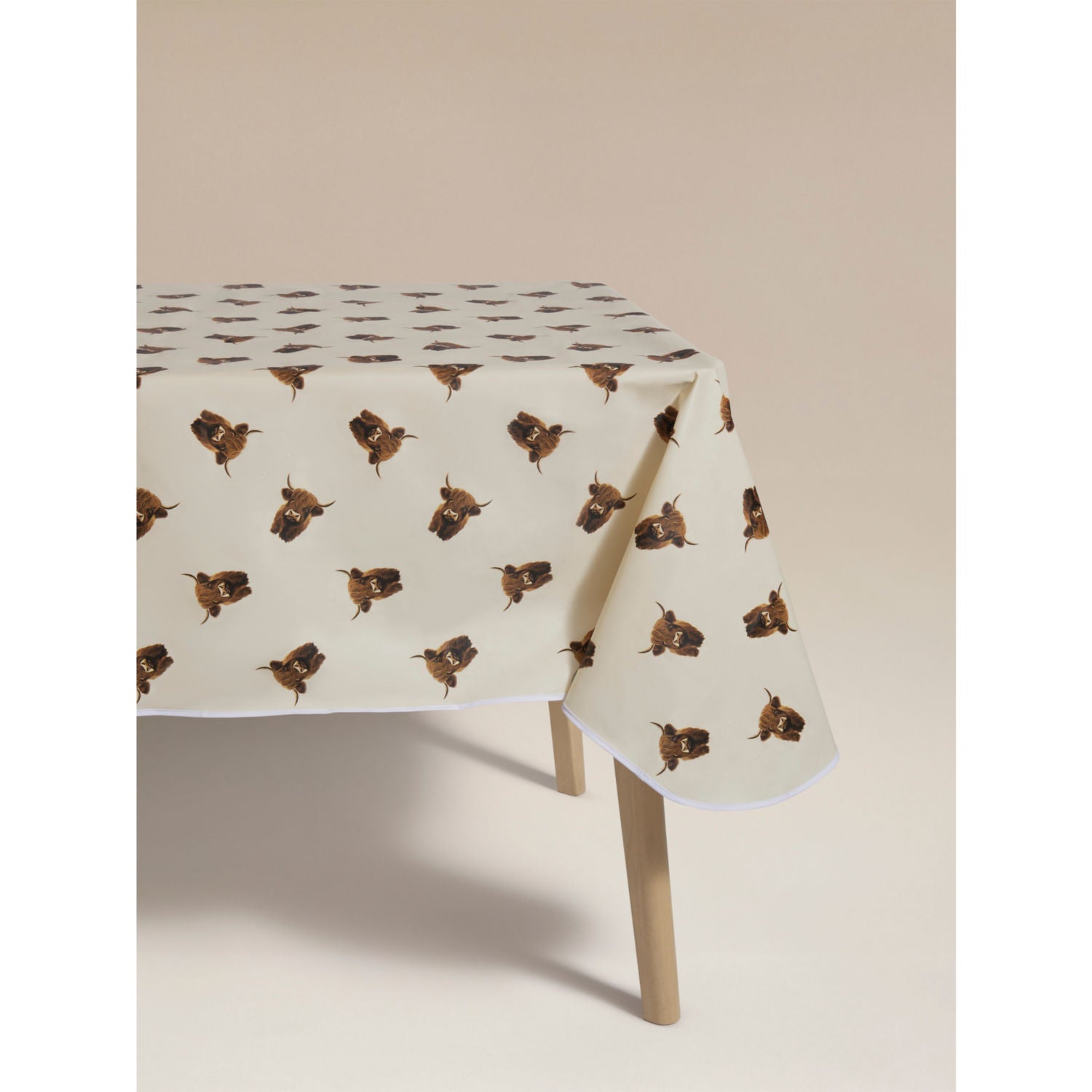 Highland cow wipeclean tablecloth in beige and white, imported from the UK