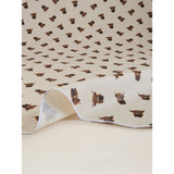 Highland cow wipeclean tablecloth in beige and white, imported from the UK