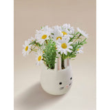 White bunny planter with artificial daisies - British product