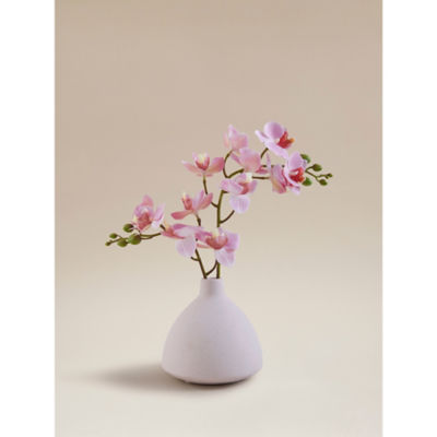 Pink artificial orchids in stripe vase, UK version