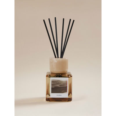 Dubai reed diffuser with raspberry and peppercorn scent, glass vessel - British product