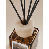 Dubai reed diffuser with raspberry and peppercorn scent, glass vessel - British product