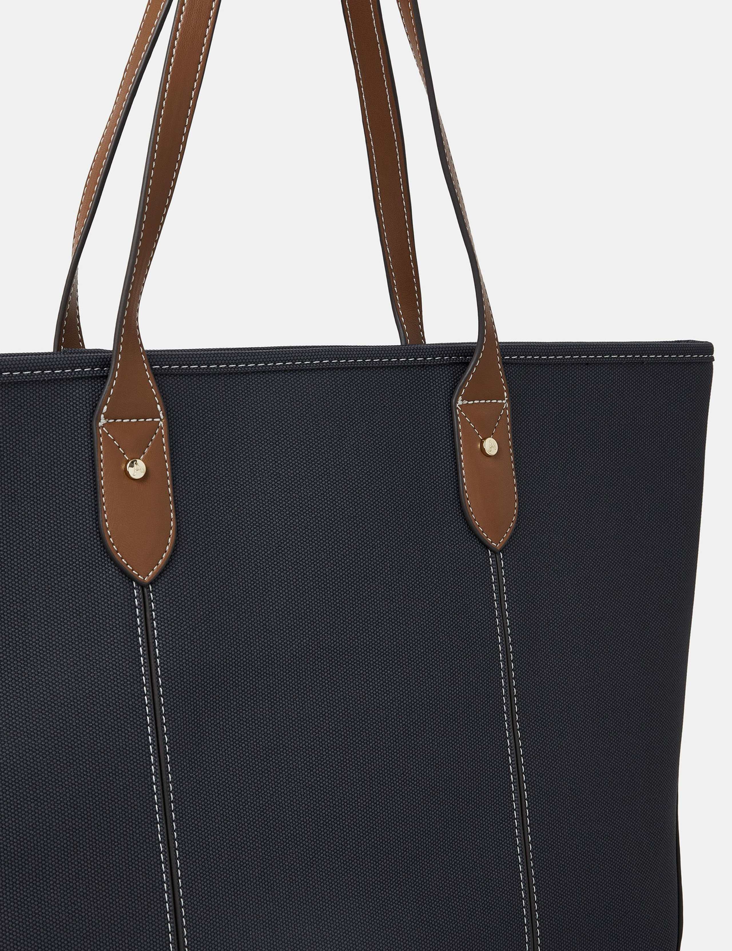 Accessorize textured zip top tote bag with contrast handles, imported from the UK