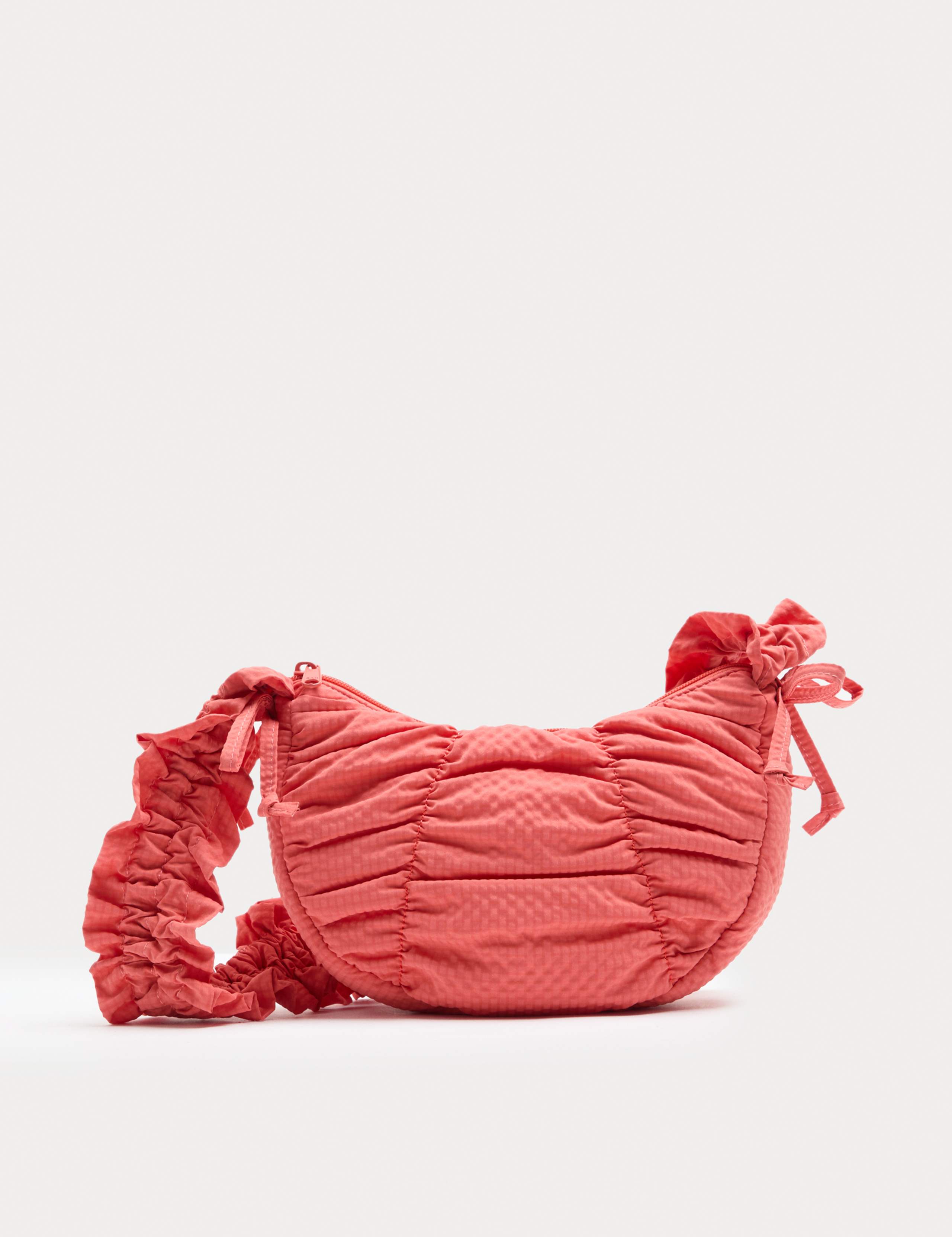 Textured crossbody bag with ruched strap and bows - British product