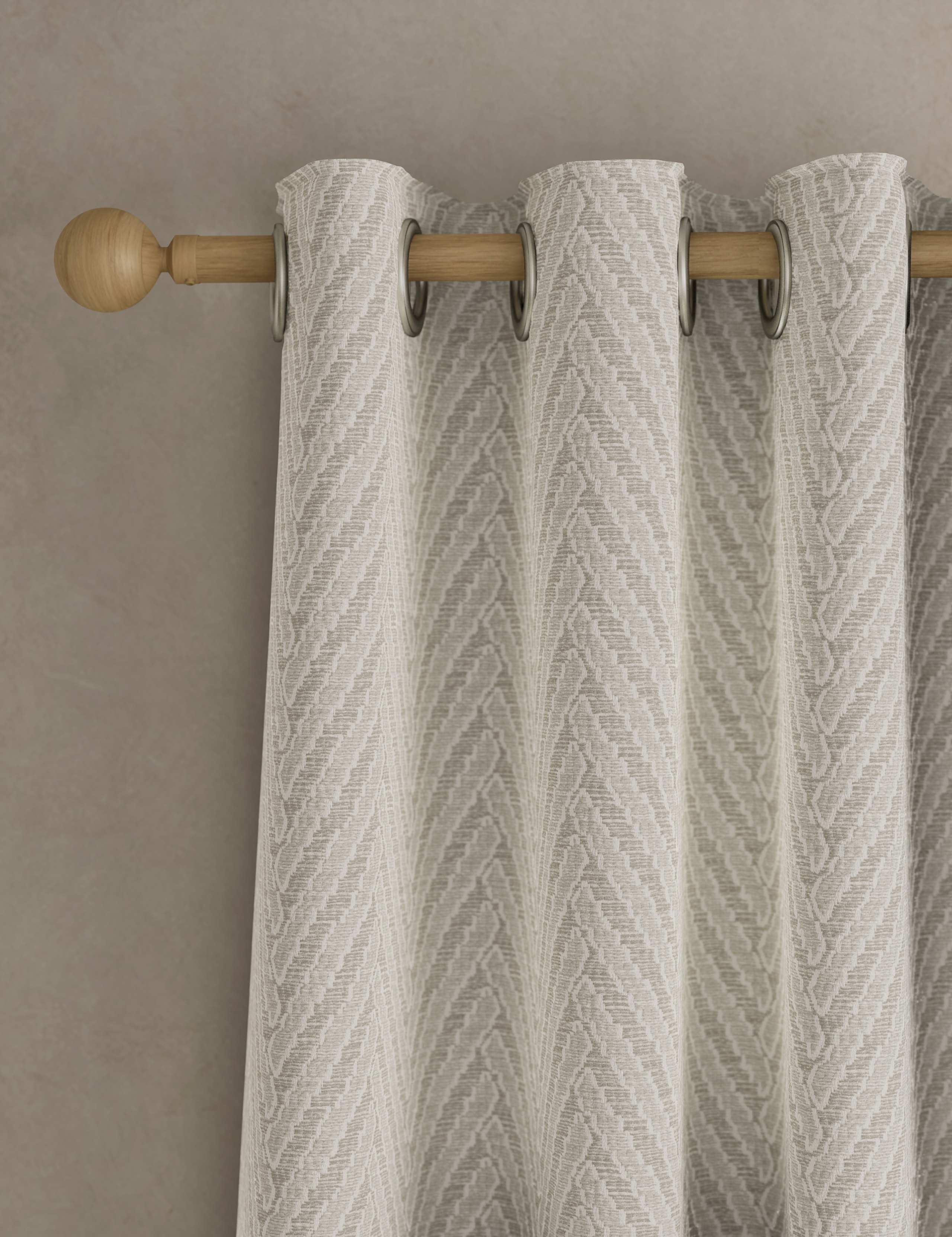 Textured herringbone eyelet curtains (British brand)