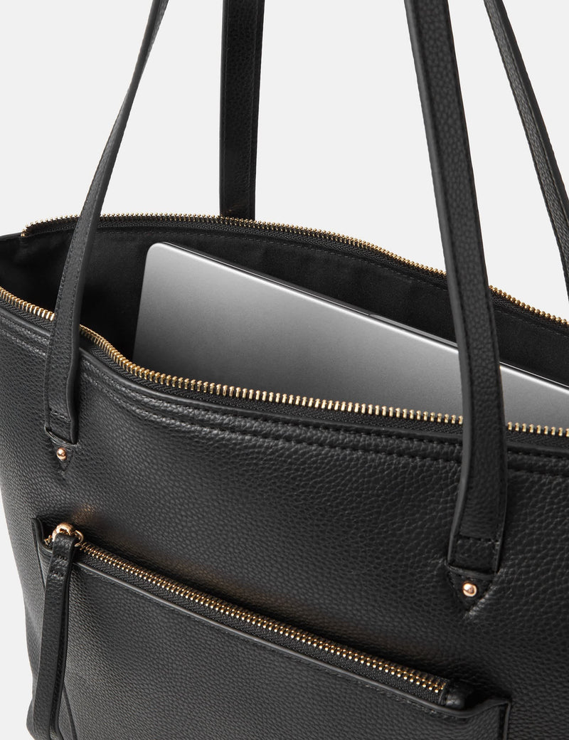 Accessorize faux leather tote bag with gold hardware, imported from the UK