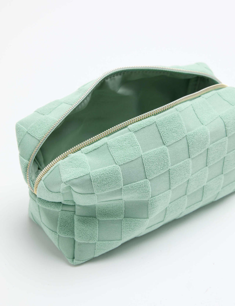 Towelling cosmetic bag with jacquard chequerboard pattern, UK version