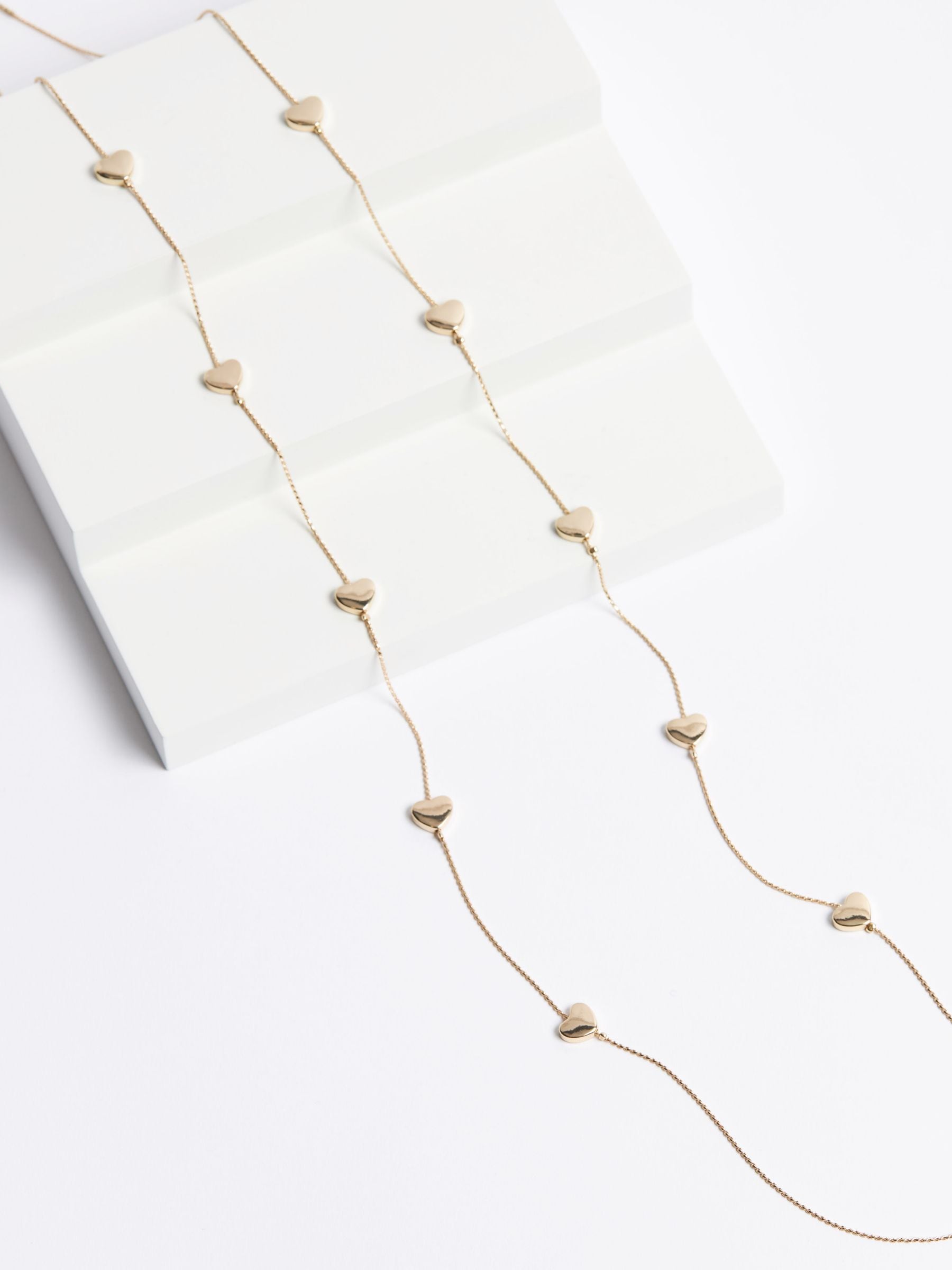 Gold tone heart long rope necklace, UK version