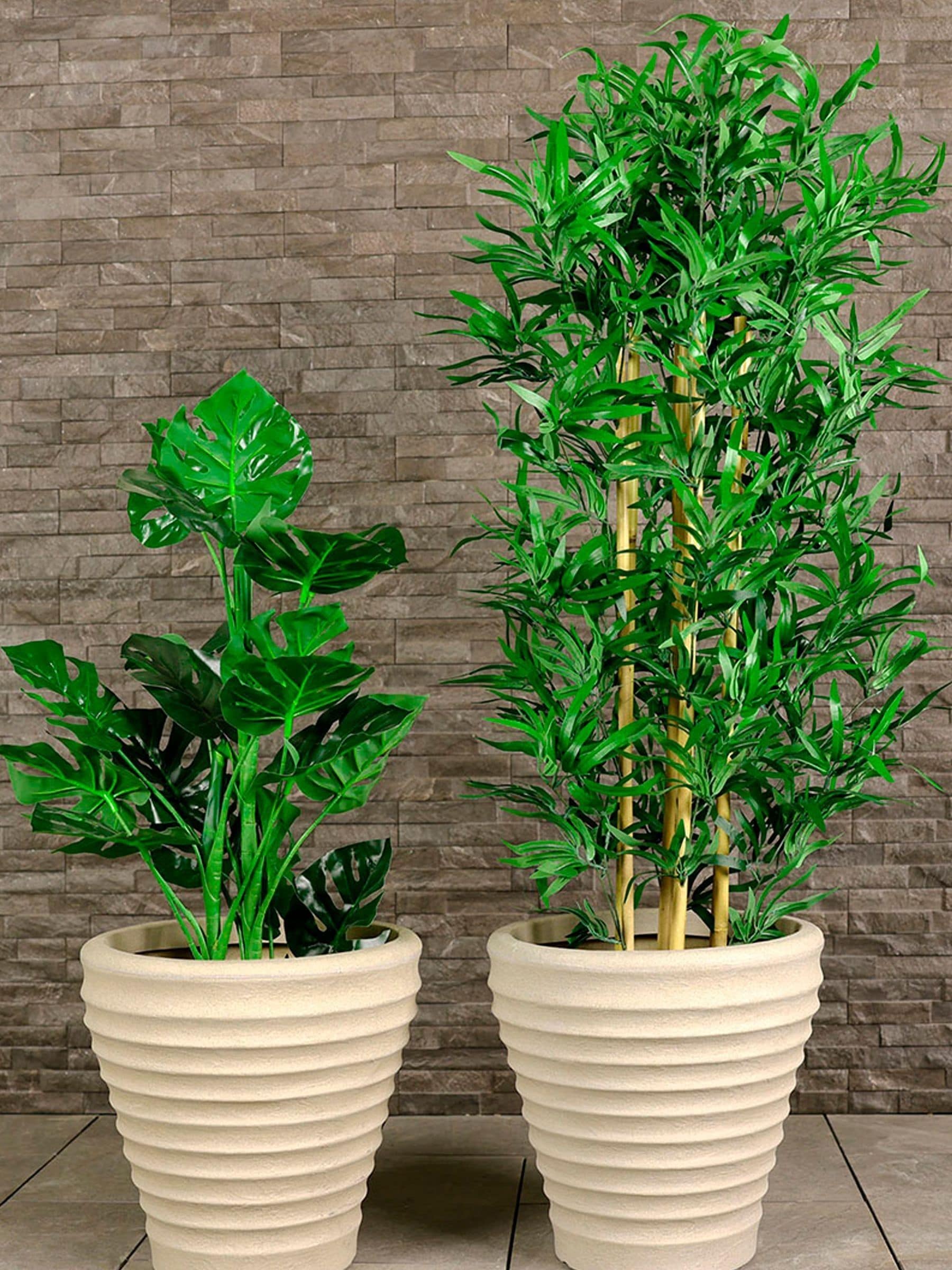 Charles Bentley Moroccan round stone garden planters pair, imported from the UK