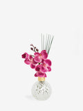 Pink artificial orchid in faceted glass vase 25cm height, imported from the UK