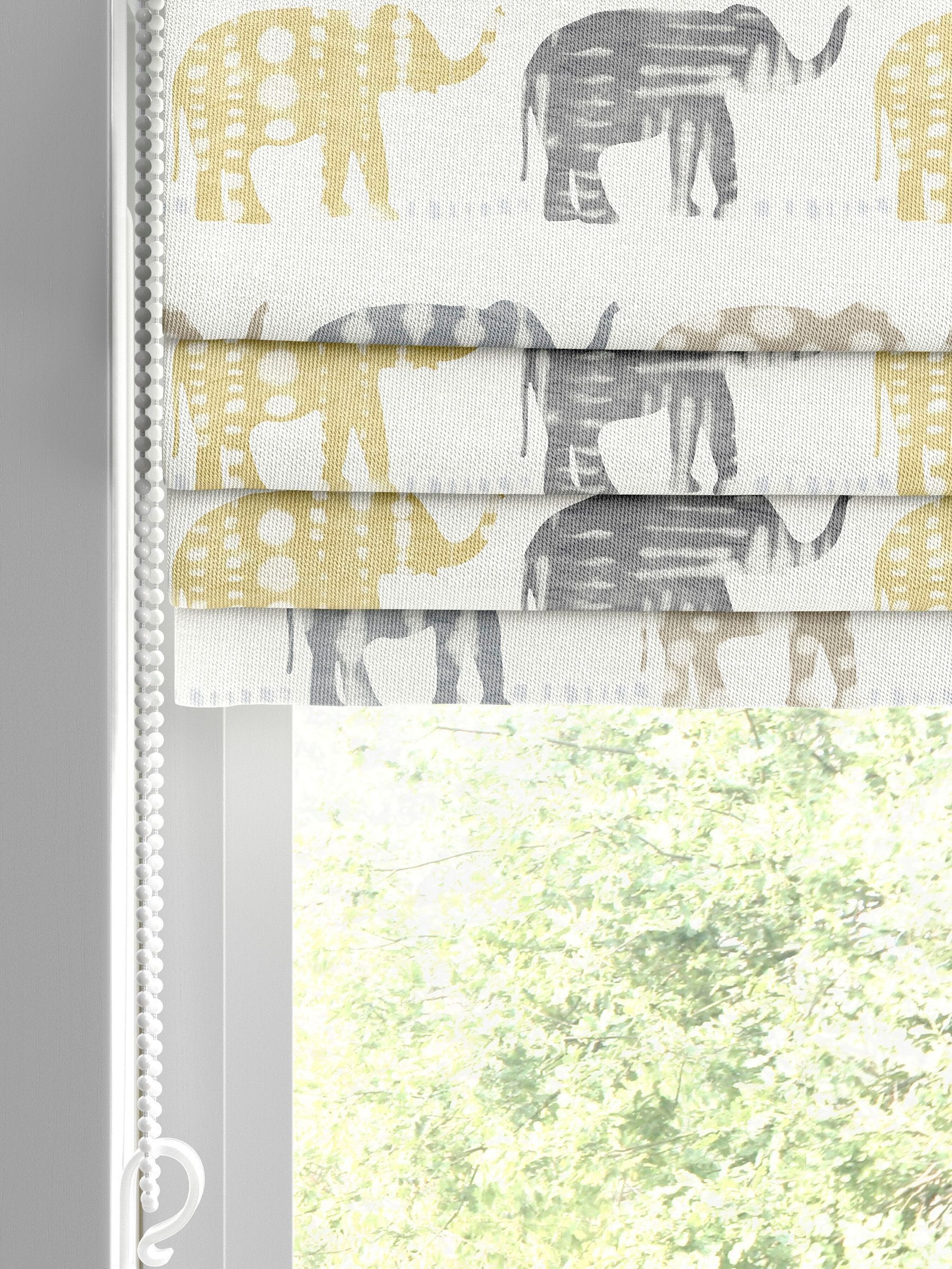 Roman blind lemon yellow with elephant pattern, imported from the UK