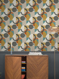 Retro Geometric wallpaper sample A4 in orange teal and yellow, imported from the UK
