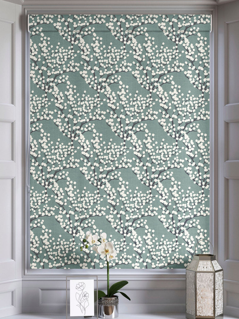 Blue Grove teal roman blind with white blossoms - British product