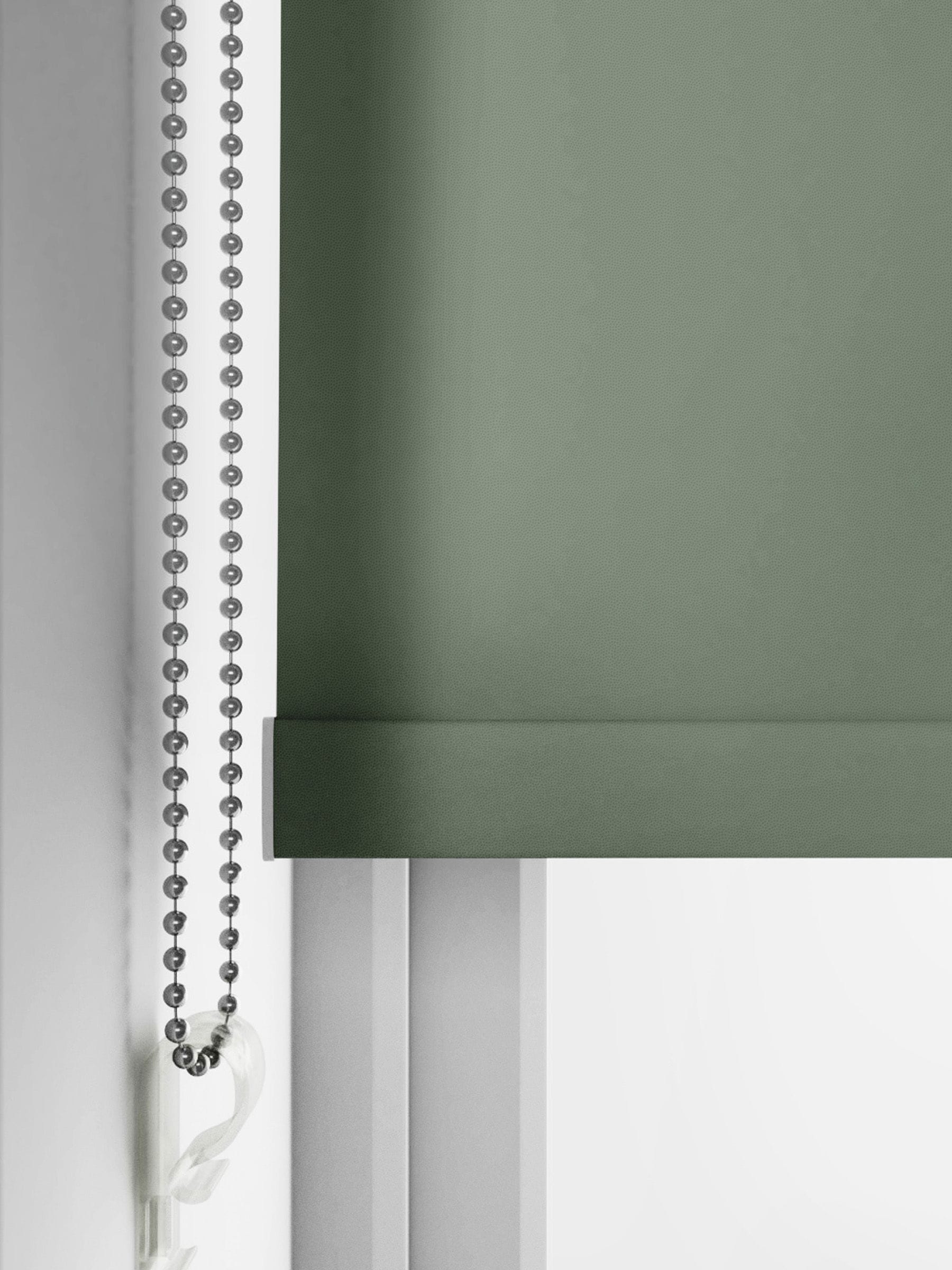 Graham & Brown green Uluwatu roller blind, UK version