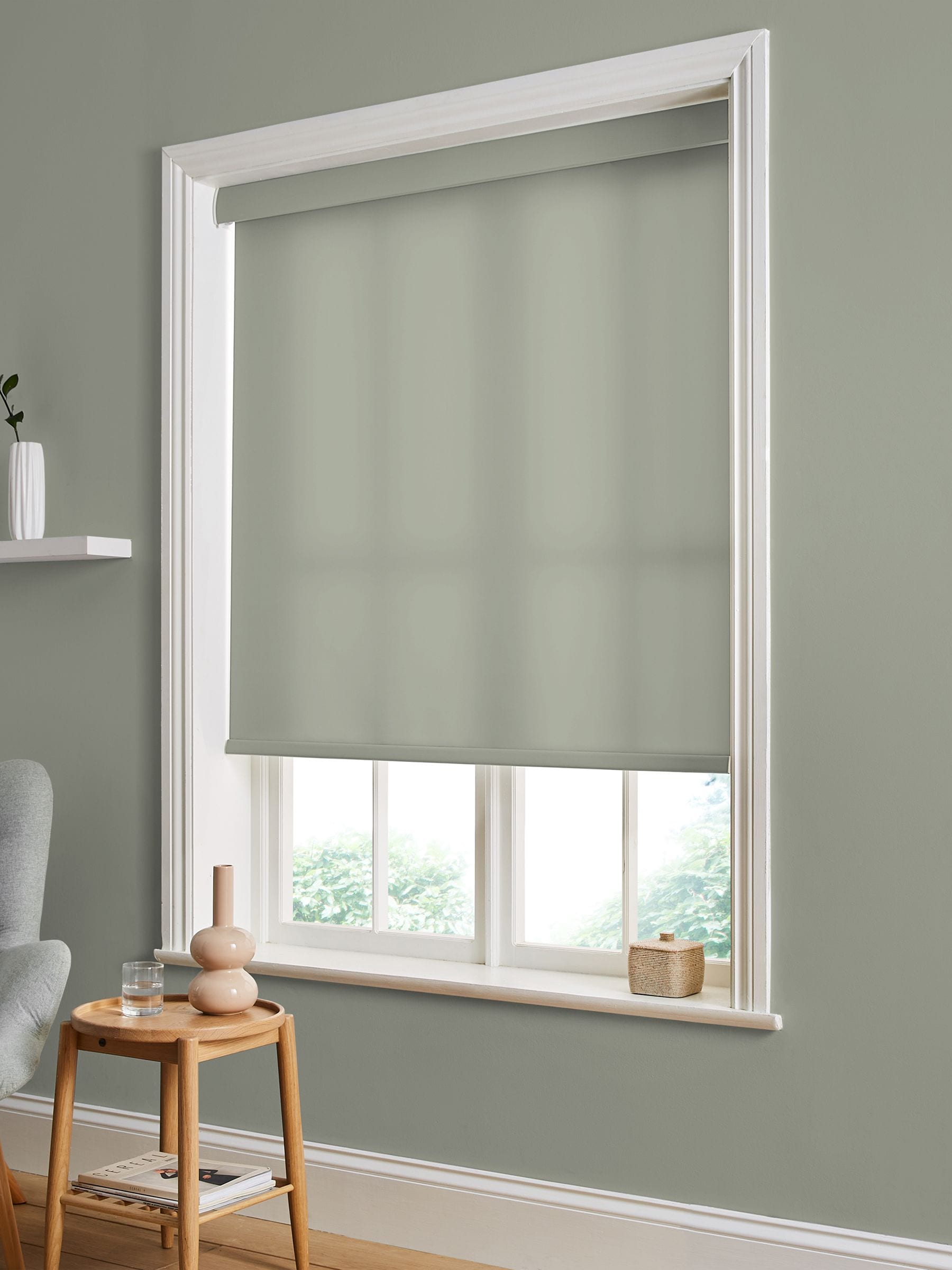 Graham & Brown Whirl roller blind in sage green, UK version