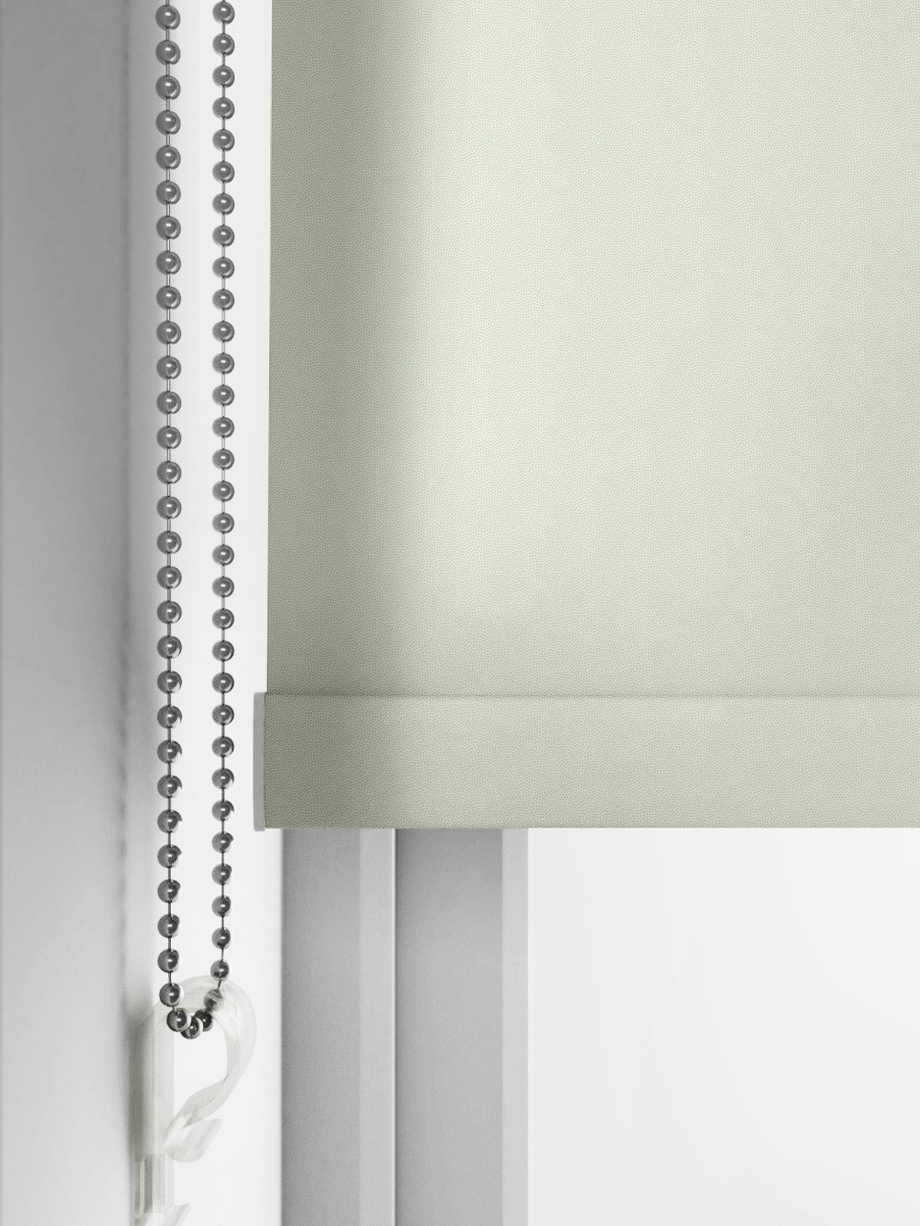 Graham & Brown Whirl roller blind in sage green, UK version