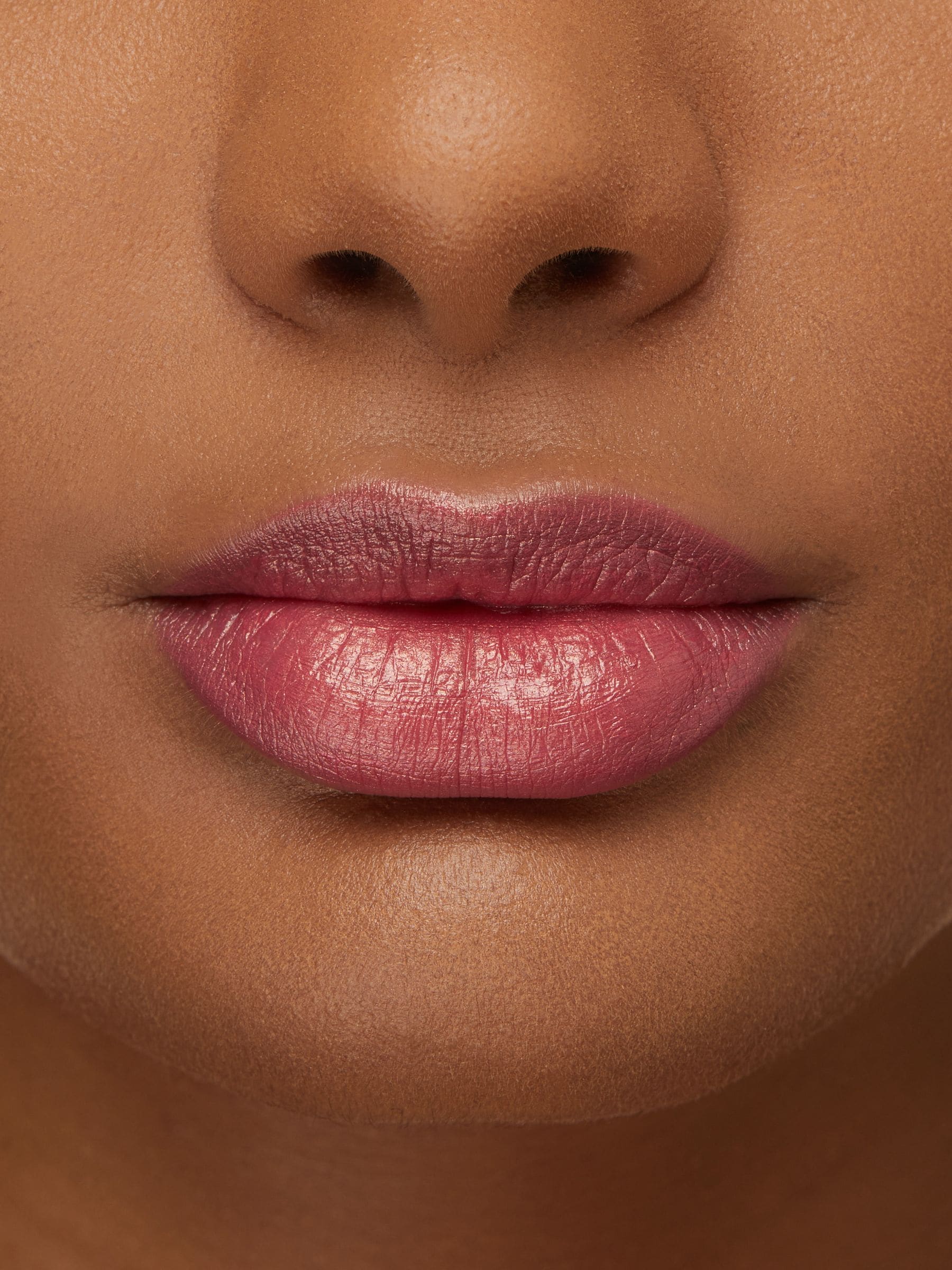 Metallic pink prosecco lipstick (British brand)