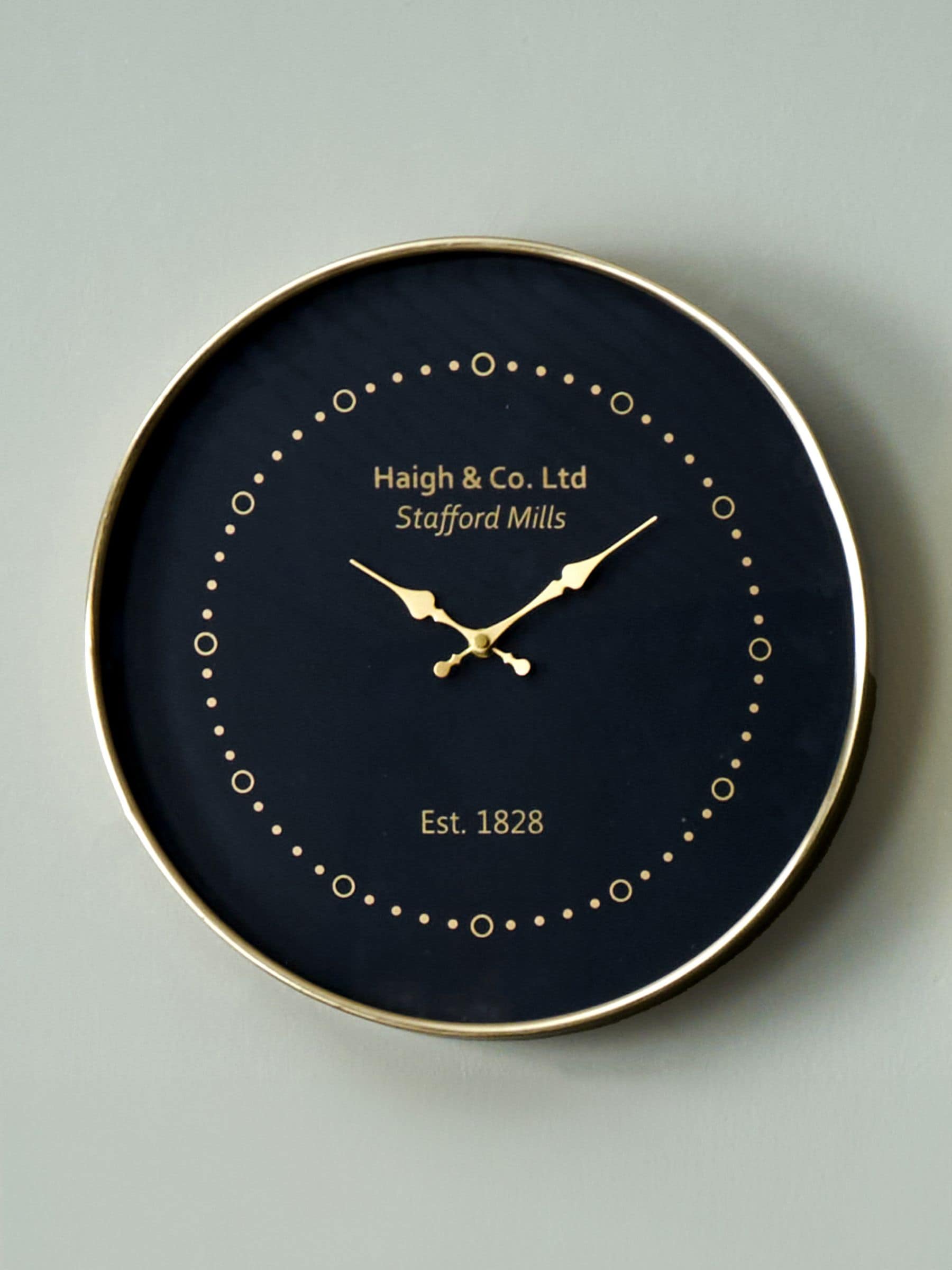 Pacific Black round wall clock with antique brass frame, imported from the UK