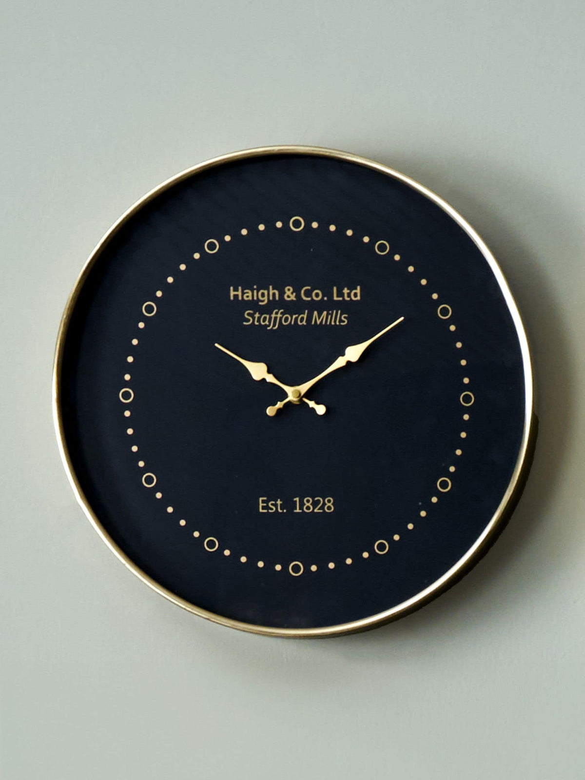 Pacific Black round wall clock with antique brass frame, imported from the UK