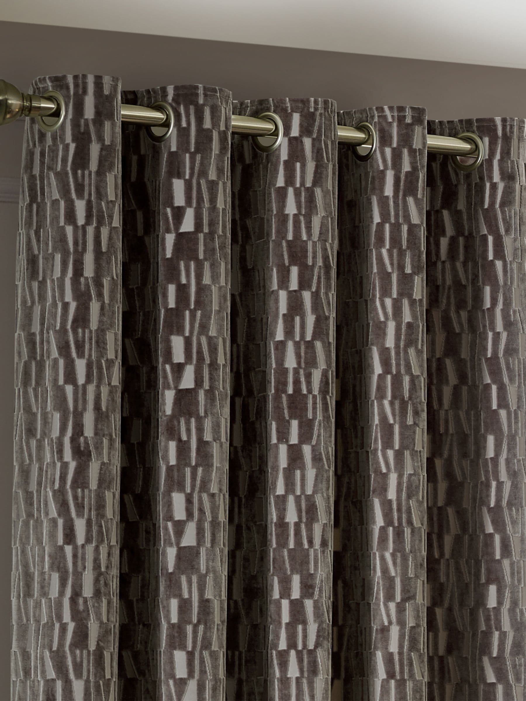 Paoletti brown Manhattan velvet fully lined eyelet curtains, UK version