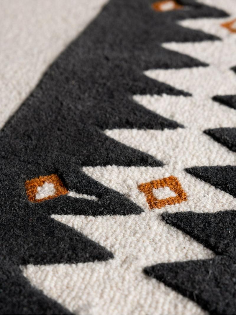 Rockett St George wool rug black diamond border, imported from the UK