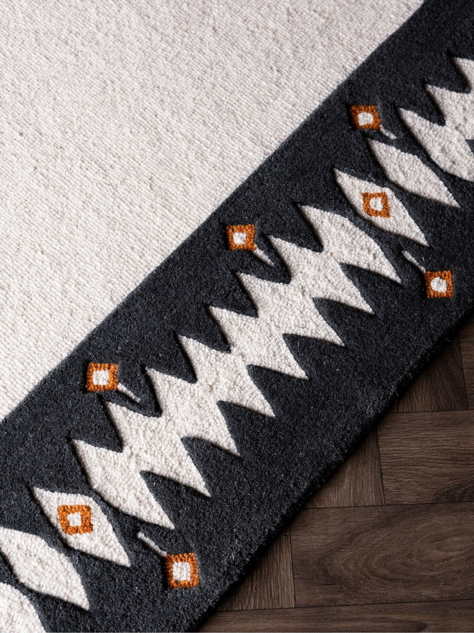 Rockett St George wool rug black diamond border, imported from the UK