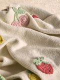 JoJo Maman Bébé knitted baby blanket with crochet fruit details, imported from the UK