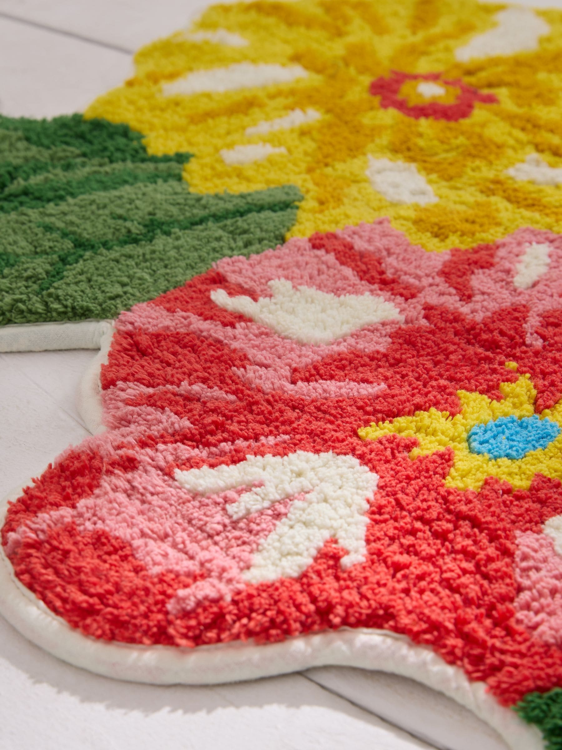 Lucy Tiffney multi floral shaped 100% cotton bath mat, imported from the UK