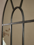 Nkuku black iron arch overmantle mirror, imported from the UK