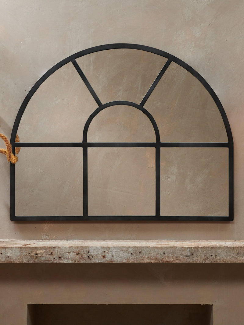 Nkuku black iron arch overmantle mirror, imported from the UK